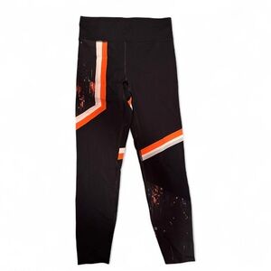 Sweaty Betty The Zero Gravity Leggings in Black and Orange